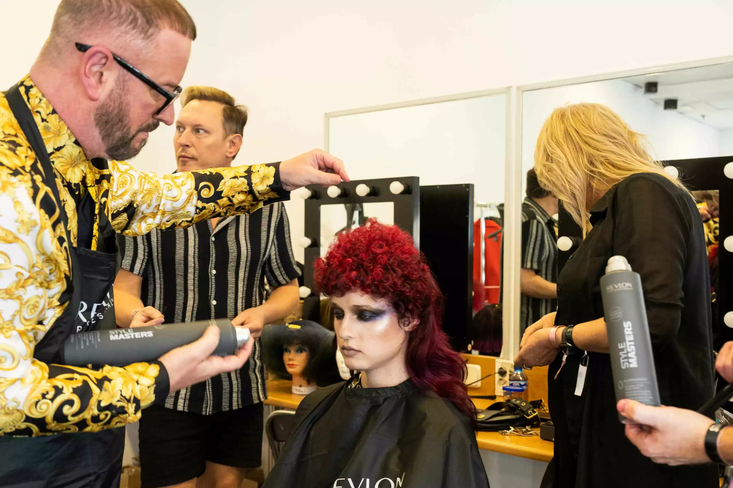 Revlon Professional ambassador Mark Lesson prepares for the IHA awards catwalk