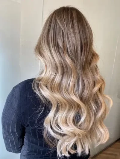 A Woman with blonde balayage