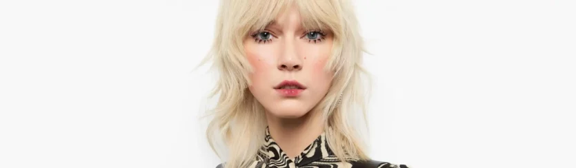 A curtain bangs look by Felicitas Hair